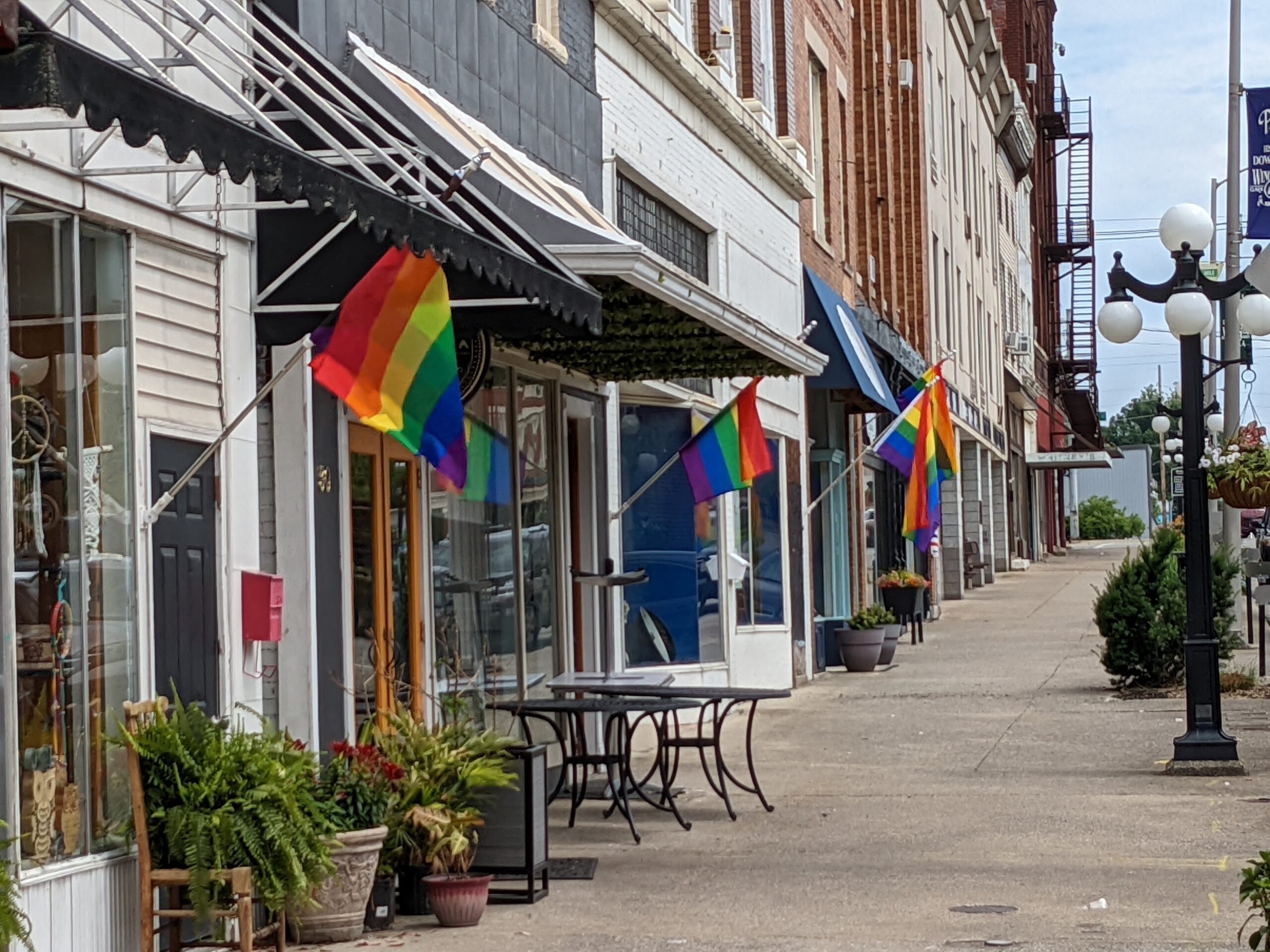 Pride flags along Main Street in downtown Winchester