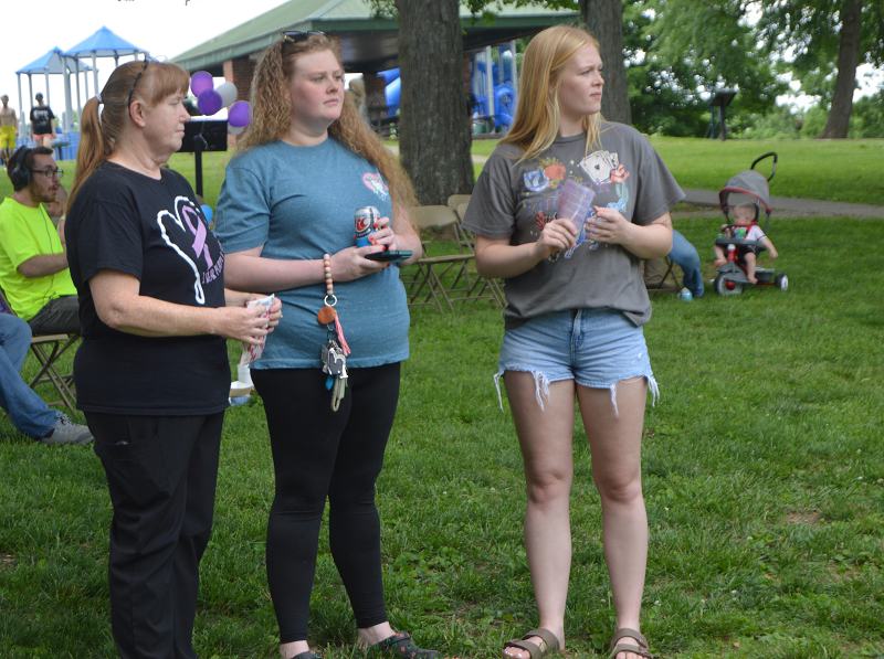 The family of Ava Brantley, 35, of Winchester, who was killed in a domestic violence incident last October, attended a Silent Cry rally at College Park this past summer. From left are Brantley’s mother, Michelle Hayes, and two sisters, Leandra and Madilyn Estes. (Randy Patrick)