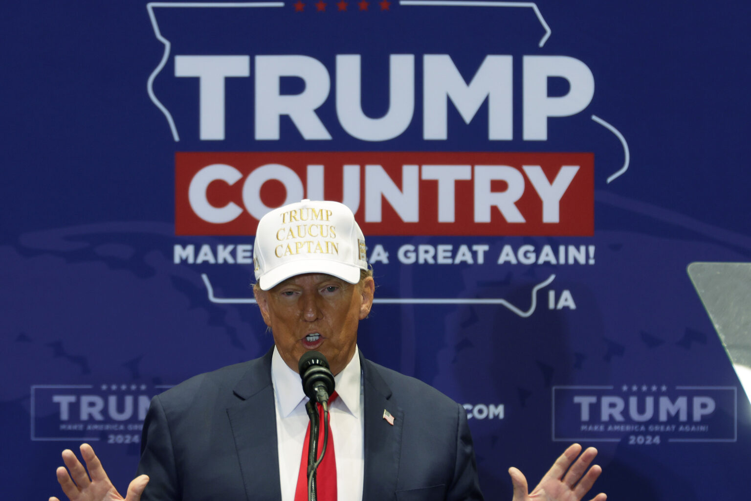 Former President Donald Trump speaks during a campaign rally in Indianola, Iowa