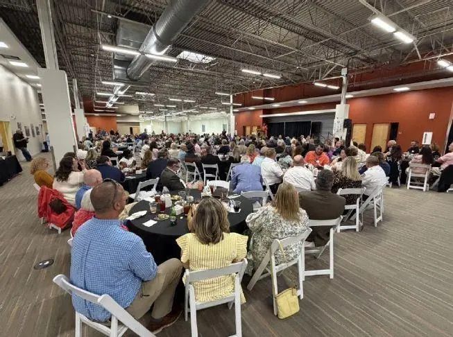 Winchester-Clark County Chamber of Commerce Executive Director Cindy Banks speaks before hundreds at the Chamber's annual banquet and silent auction at BCTC's Winchester campus on Thursday, May 7. (Matt Cizek)