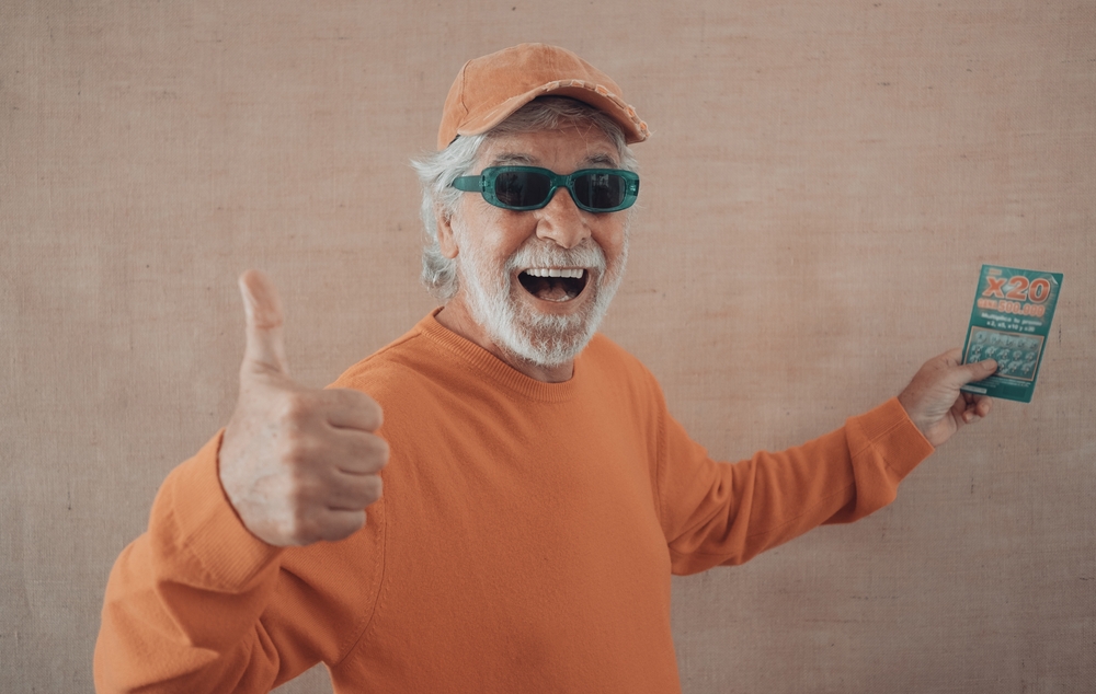 A man celebrates winning the lottery.