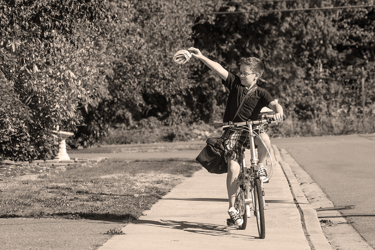 A vanishing sight in the 21st century: a paperboy.