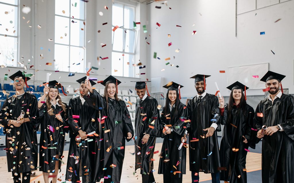Students celebrating graduation